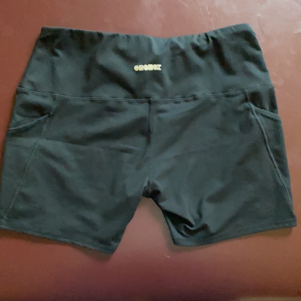 Black athletic shorts size XL with hip pockets
